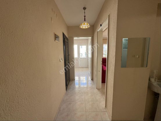 Kuşadası Güzelçamlı'da Satılık 2+1 Ayrı Mutfak Ara Kat Daire