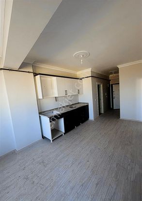 Sürer Emlak`tan Satılık Sıfır 1+1 Daire`miz Ara Katta