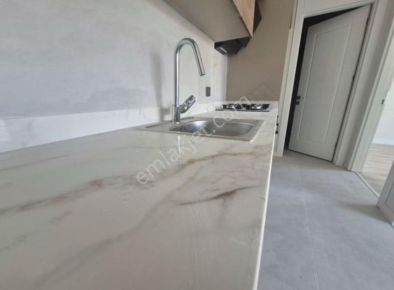 Gölbaşının Seçkin Projesinde Ara Kat 1+1 Kiralık Daire