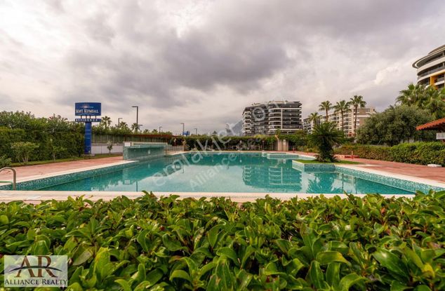 Mavi Kumsal'da Lüks 2+1 Bahçe Katı Net 109 M2 Full Eşyalı