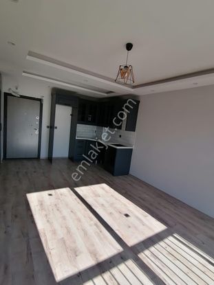 Birlik Gayrimenkulden Çarkıpare De Stad Karşısı 1+1 İskanlı Yüksek Kira Getrili Satılık