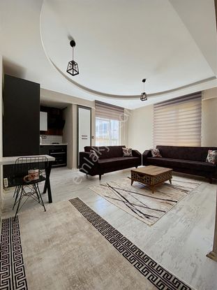 Afyon Özsu Emlak'tan Uydukentte Eşyalı Kiralık 1+1 Geniş Daire