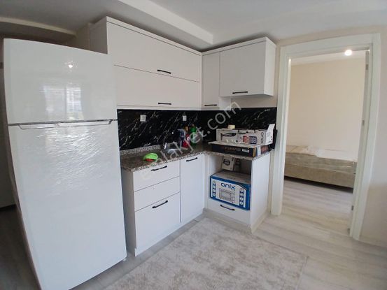 Kurtuluş Mahallesi’nde Sıfır Eşyalı, Klimalı 1+1 Kiralık Daire!