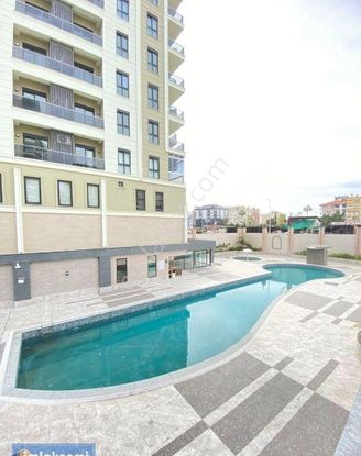 Emlaknomi'den Mahmutlar Satılık 1+1 Sıfır Deniz 600 Metre Full Aktiviteli Arakat Kapalı Otopark.