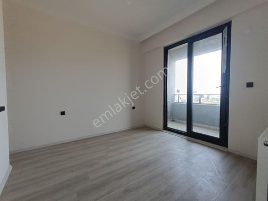 Sancak Emlaktan Gömeçte Kapali Mutfak On Cephe Ferah 2+1daire