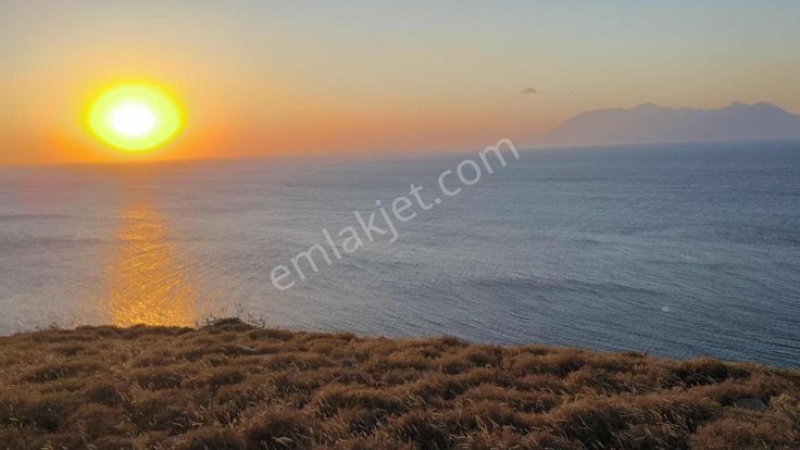 İmroz Emlak'tan Mesadi Mevkii'de 850 M2 Deniz Manzaralı Arazi