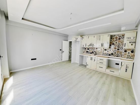 Kuşadası Davutlar'da Ara Kat 75 M2 Satılık 2+1 Daire