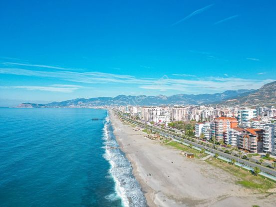 Alanya Mahmutlar’da | Denize Sıfır | Eşyalı 2+1 Satılık Daire